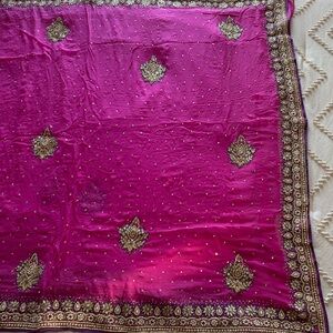 Elegant Pink Saree with Gold Embellishments